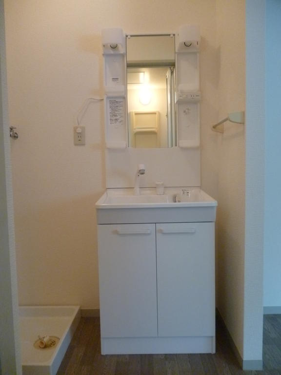 Washroom. Bathroom Vanity Washing machine in the room