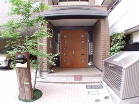 Entrance. Auto-lock on-site waste storage stylish entrance