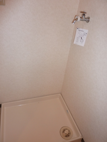 Other Equipment. Washing machine in the room