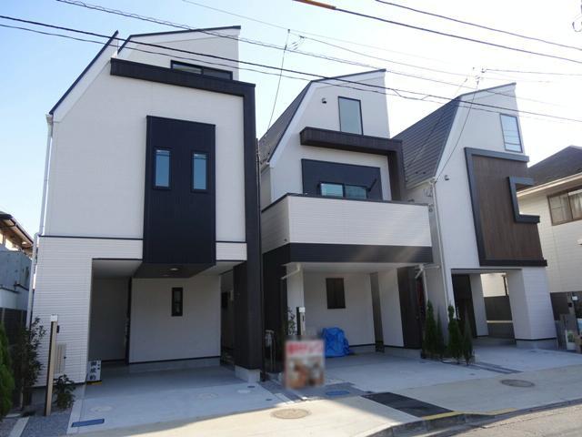 Local appearance photo. B Building (center) C Building (right) appearance