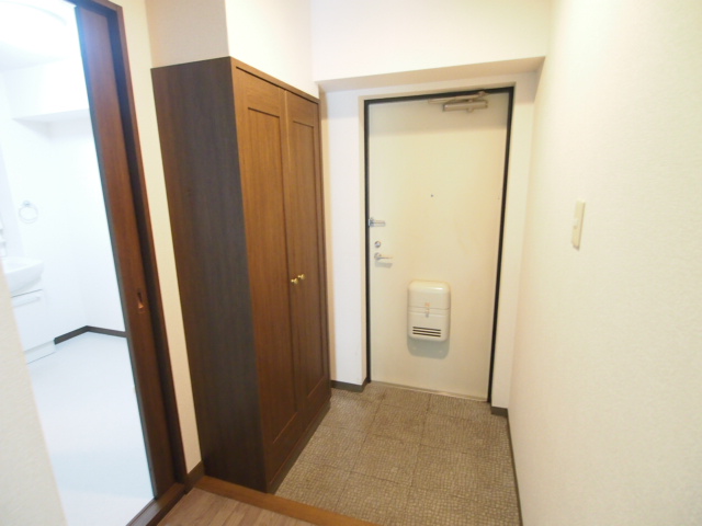 Entrance. It is a big shoebox is happy. 