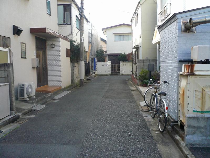 Local photos, including front road. Development has been a public road on the front