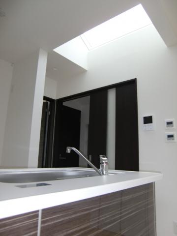 Kitchen. There is a top light in the kitchen aside, It is very bright. Since it hit even stairs aside, It is safe. 