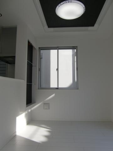 Living. Dining has stylish niche shelf on the wall subjected to crafted ceiling. It is very bright. 