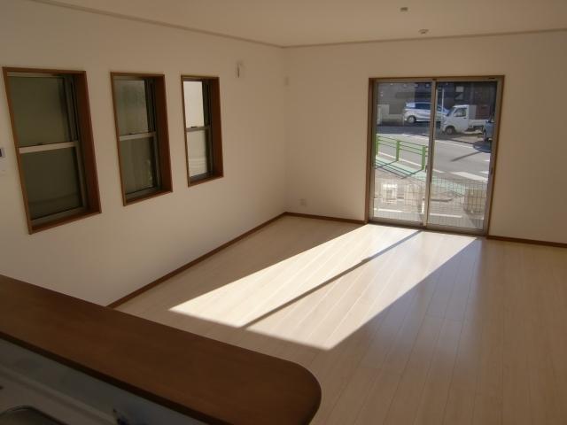 Living. We look at the living room from the kitchen side.