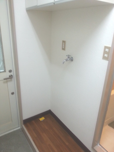 Other Equipment. Washing machine in the room