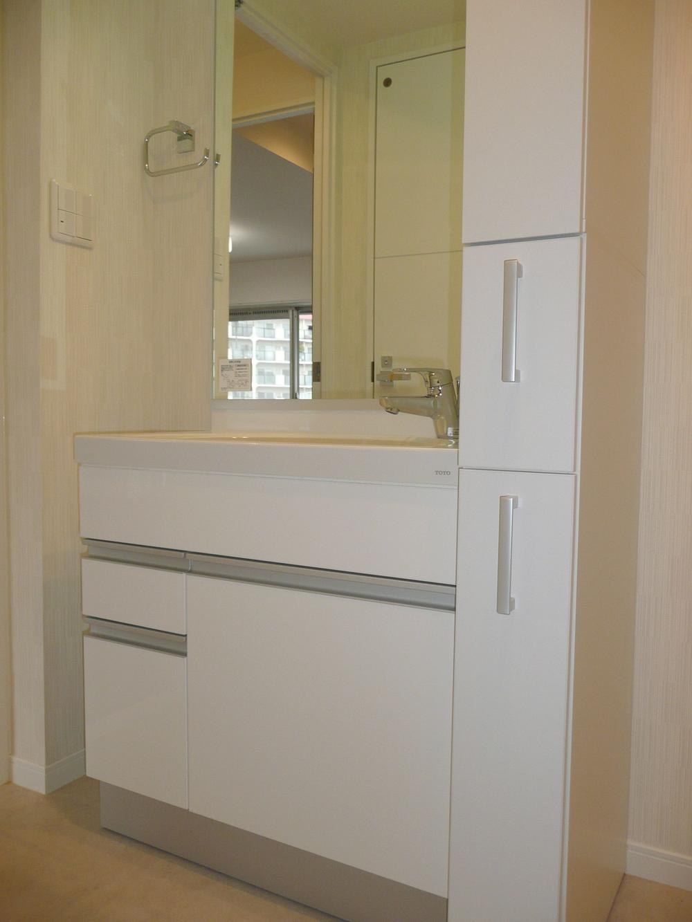 Wash basin, toilet. Bathroom vanity