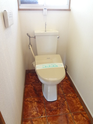 Toilet. Bright warm water cleaning toilet seat with a window