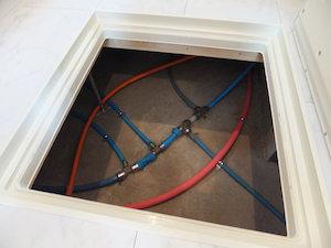 Other. Under the floor of the pipe