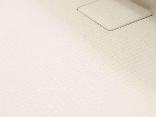 Bathing-wash room.  [Wave diamond pattern floor] To facilitate drying weaken the surface tension of water droplets, It employs a unique floor pattern. Also reduces the fear of slipping on wet floor.