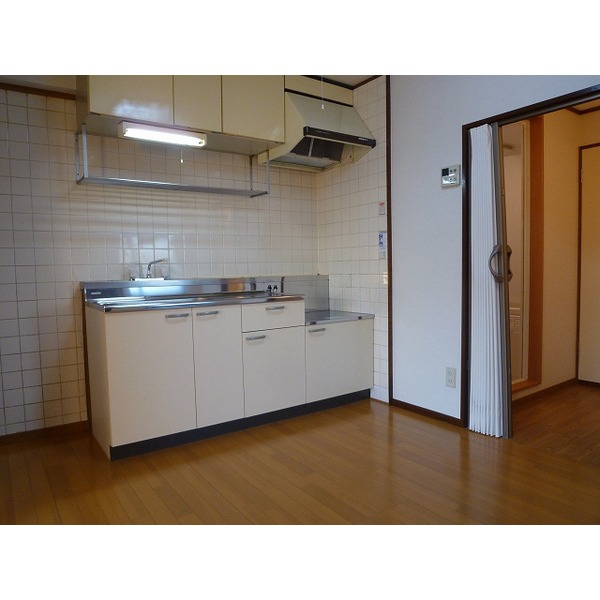 Kitchen. Is another room.