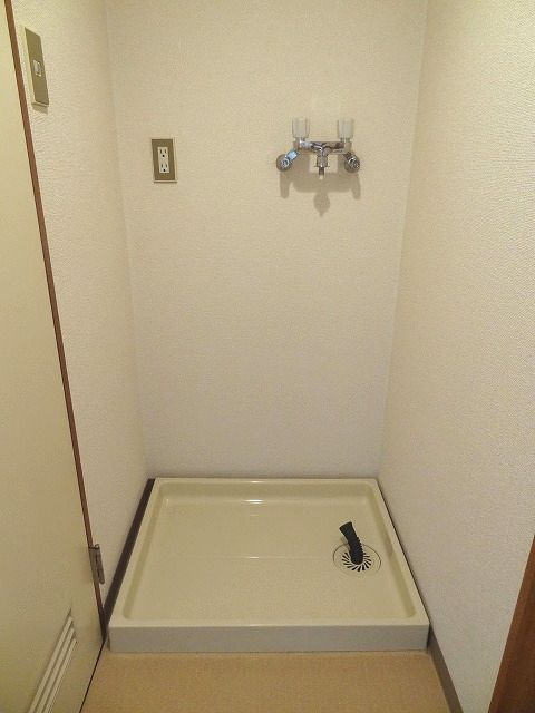 Other Equipment. Washing machine in the room