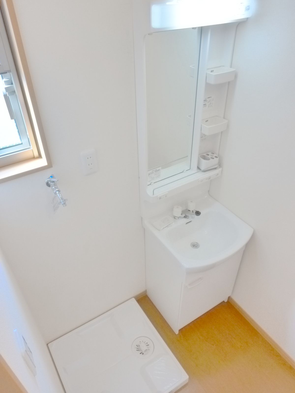 Washroom. Washing machine in the room