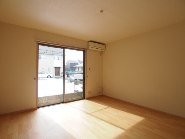 Living and room. Flooring is very beautiful. 