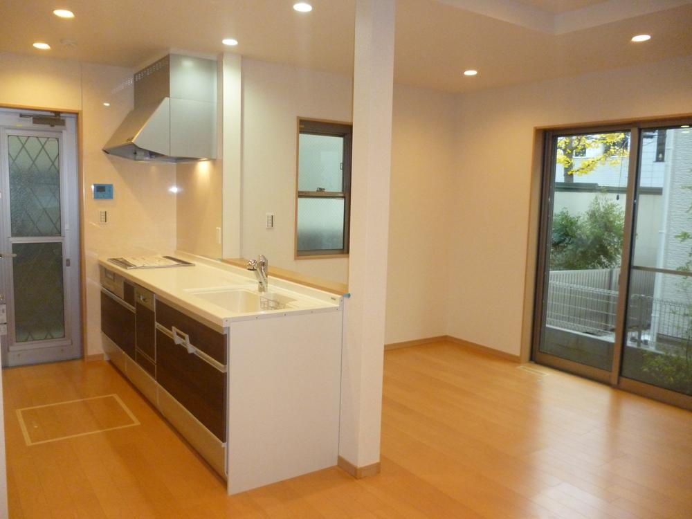 Kitchen. Everyone happily cooking family in the open kitchen