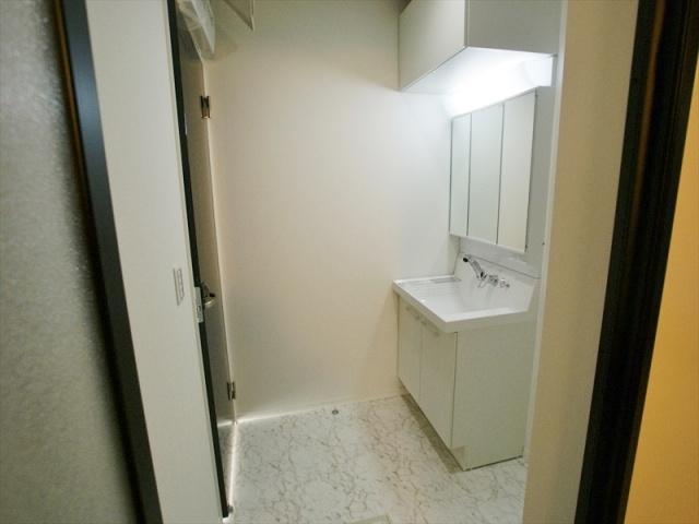 Wash basin, toilet. Vanity is vanity with happy to wife three-sided mirror. Fishing cupboard is a storage capacity pat so also with.