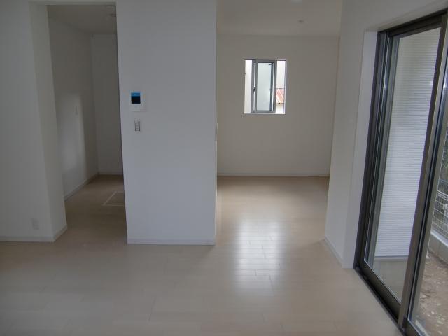 Living. Living is. Dining is back, The front is the sofa space.