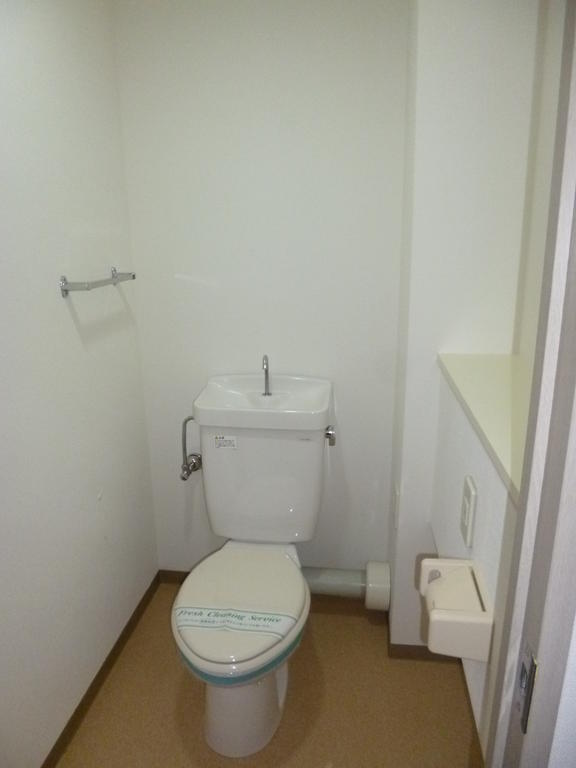 Toilet. With over towel