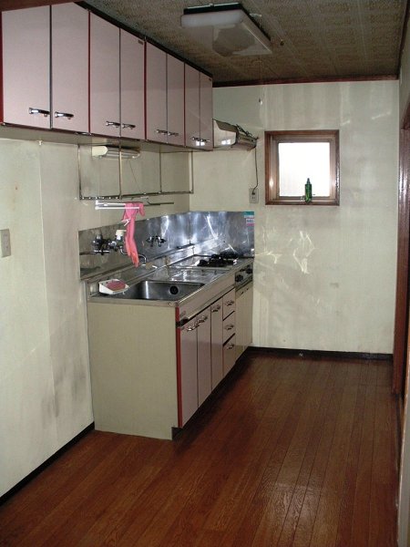 Kitchen. There is also a kitchen storage, There is a small window.