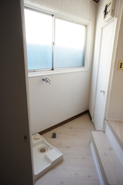 Other Equipment. Washing machine in the room