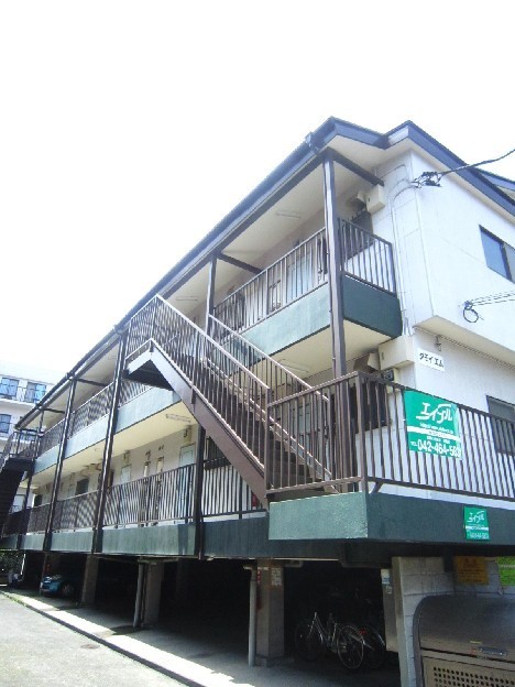 Building appearance. Building the first floor parking space