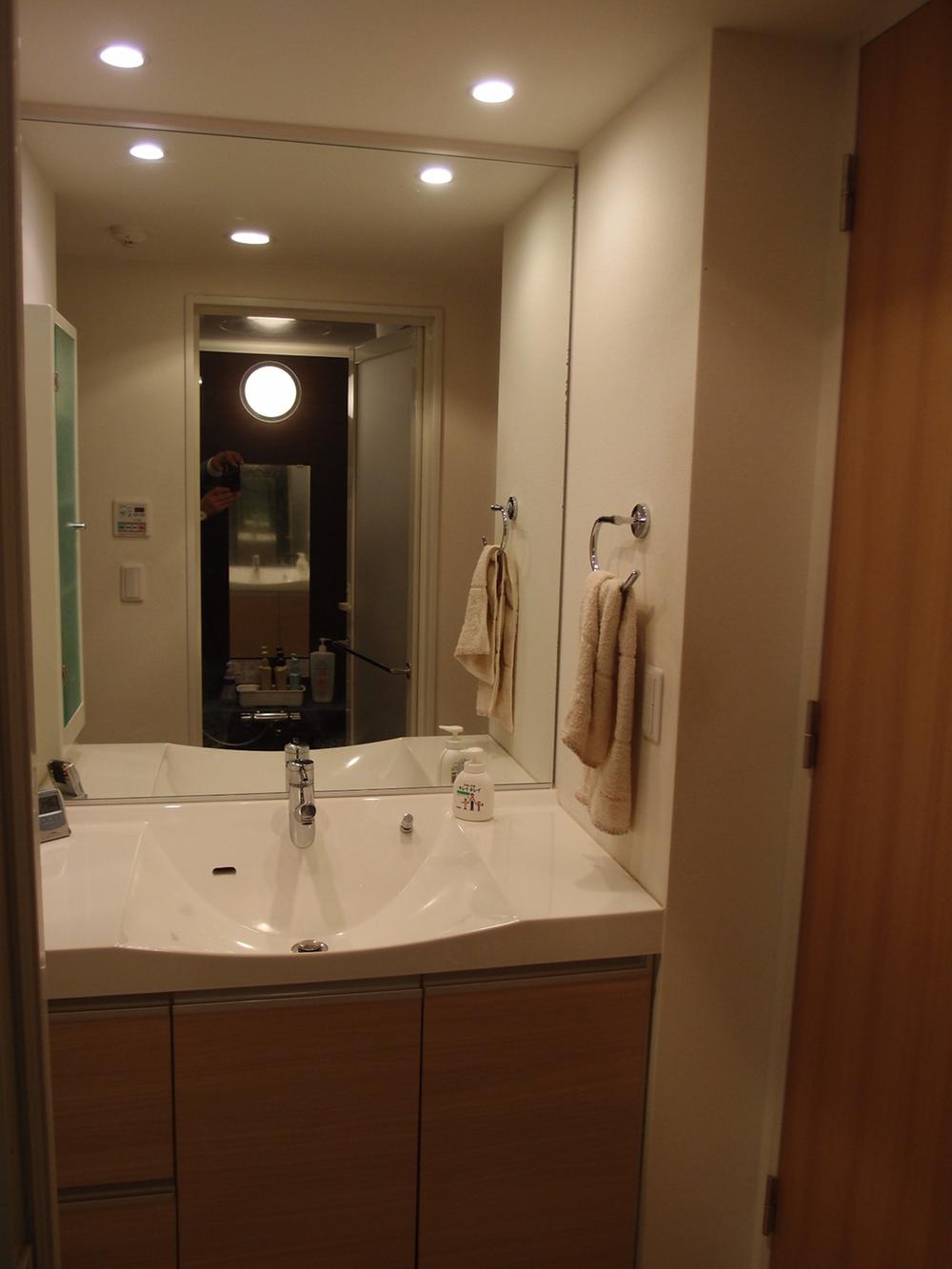 Wash basin, toilet. Bathroom vanity