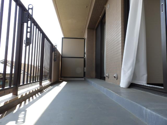 Other common areas. It is a south-facing balcony.