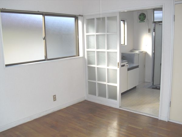 Other room space. White sliding door is, Retro cool.