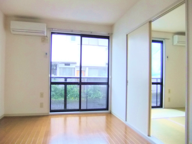 Living and room. Also contains a large sun window