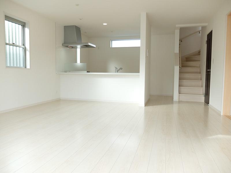 Living. Counter kitchen and living room stairs