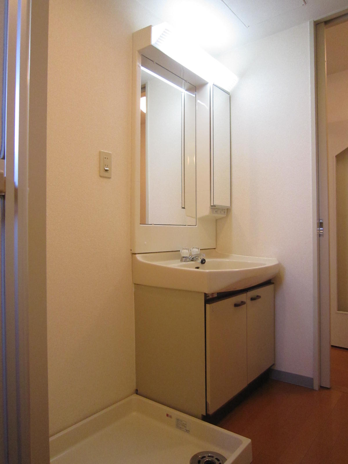 Washroom. Bathroom vanity, Washing machine Storage. 