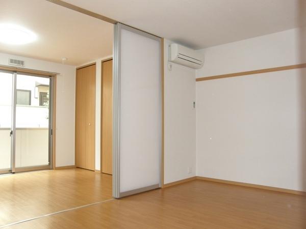 Living and room. 105, Room is marked with a window in the wall