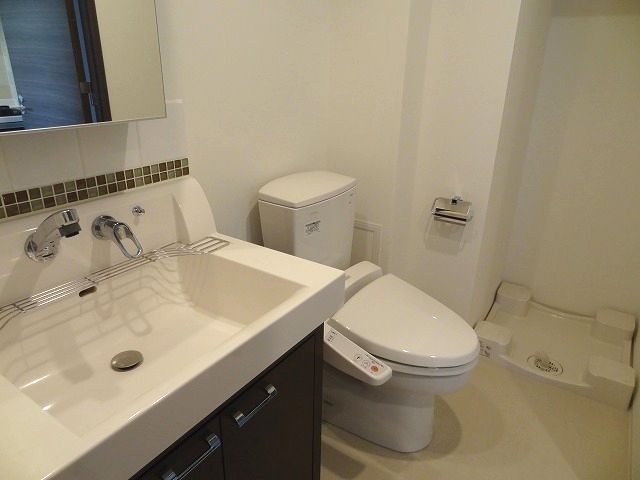 Toilet. toilet ・ In Laundry Area is one space