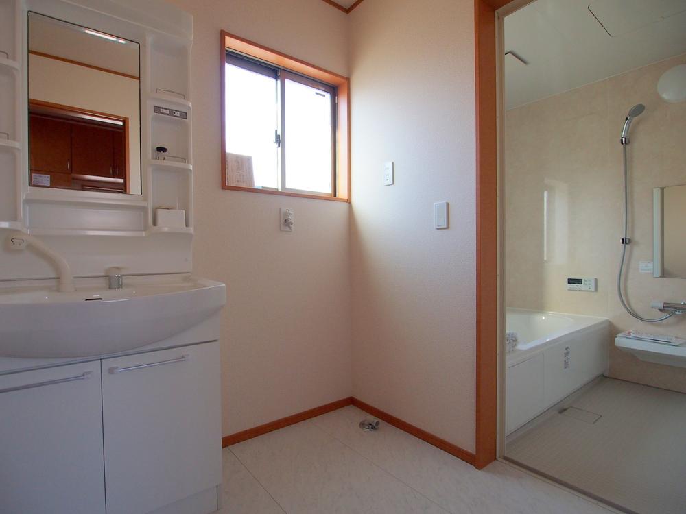 Wash basin, toilet. Washroom