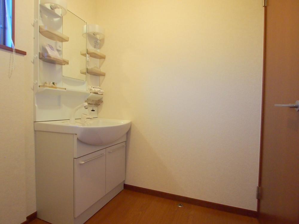 Wash basin, toilet. Washroom