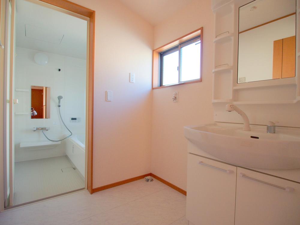 Wash basin, toilet. Washroom