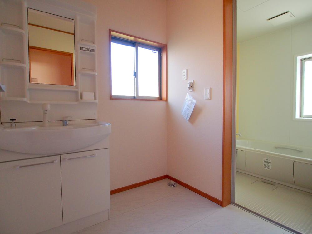 Wash basin, toilet. Washroom