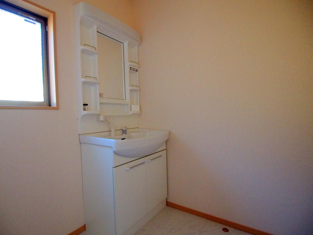 Wash basin, toilet. Washroom