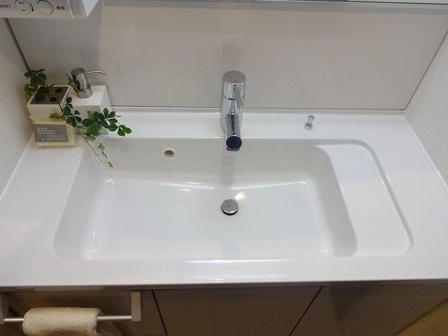 Wash basin, toilet. Bathroom vanity