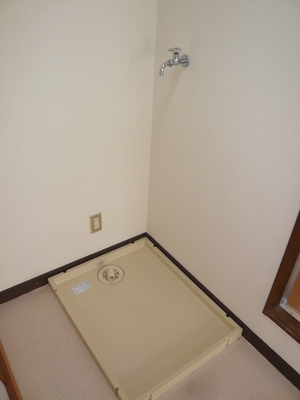 Other Equipment. Washing machine in the room