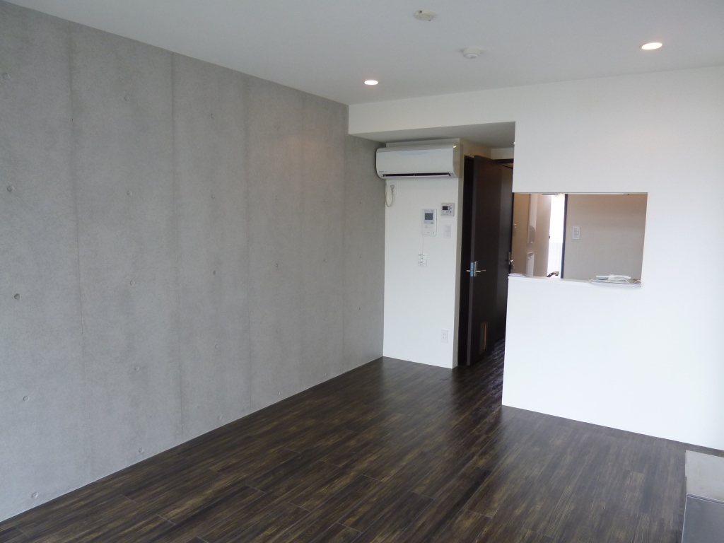 Living and room. It is a photograph of the same type of room.