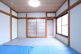 Living and room. Washing machine in the room