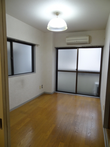 Living and room. It is a bright room with two-sided lighting.