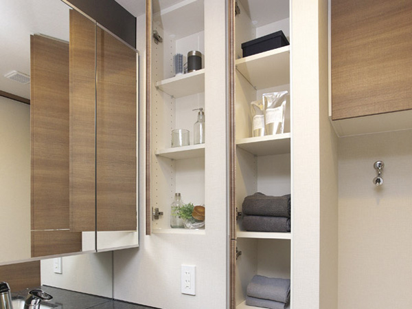 Bathing-wash room.  [Linen cabinet] Set up a convenient linen warehouse for storage of such sanitary supplies. It maintains the integrity of the organized space.