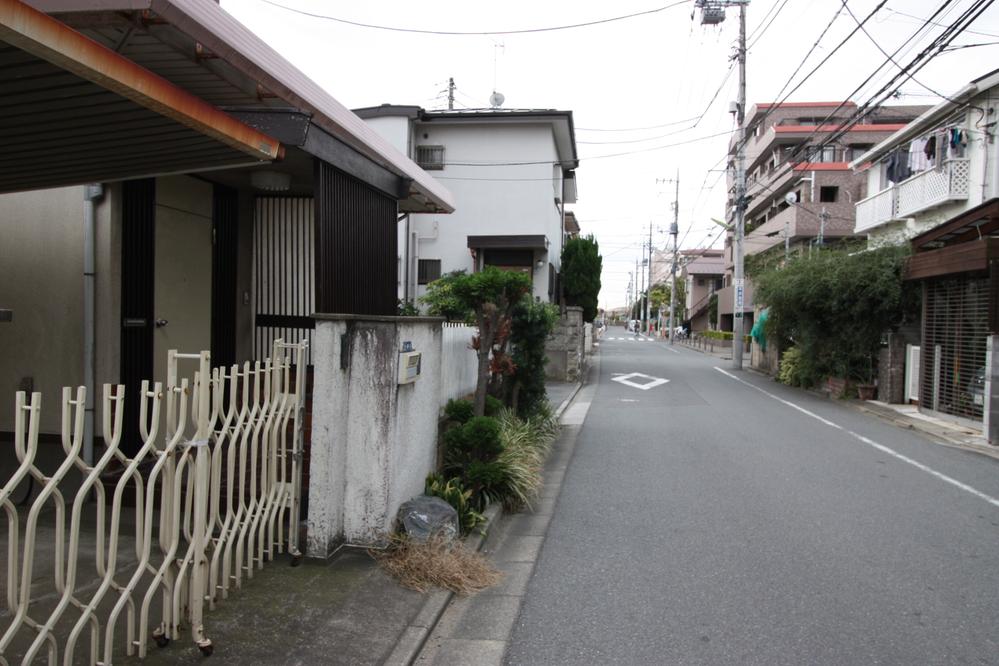 Other. North-west side of the road (about 6m). A wide road, Garage is also Lele.