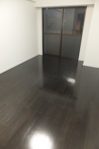 Living and room. It is dark outside for the night photo.