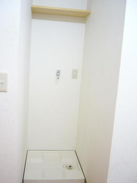 Other Equipment. Washing machine in the room