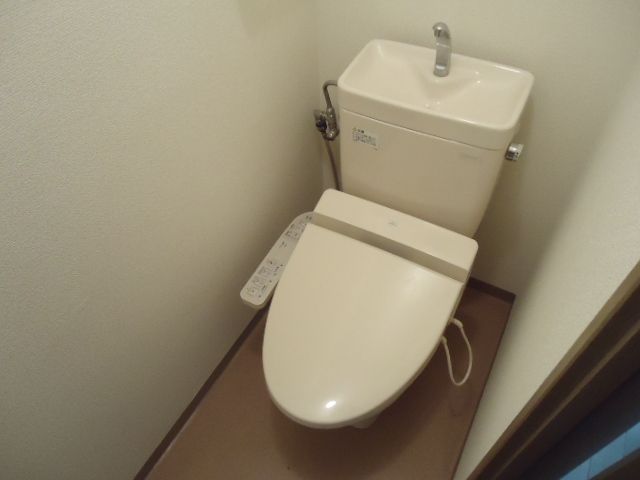 Toilet. Reference is a picture.