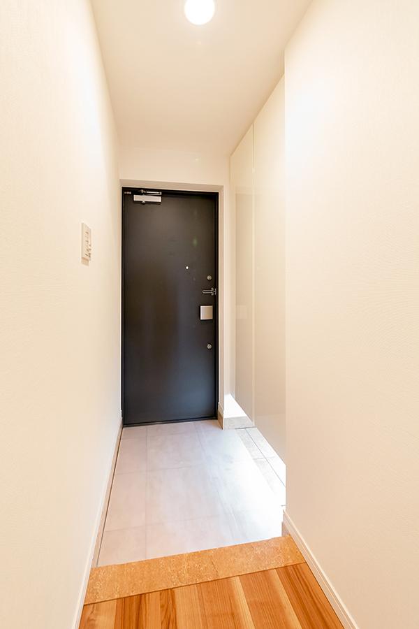 Entrance. There is a footwear putting the entrance.