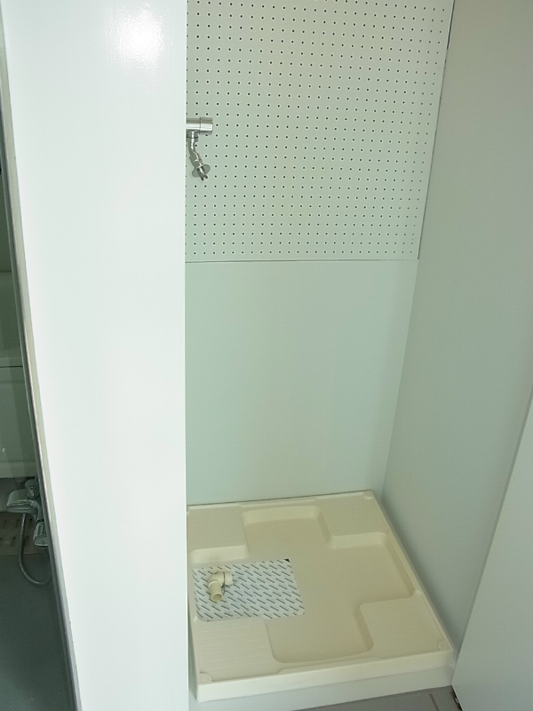 Other Equipment. Washing machine in the room